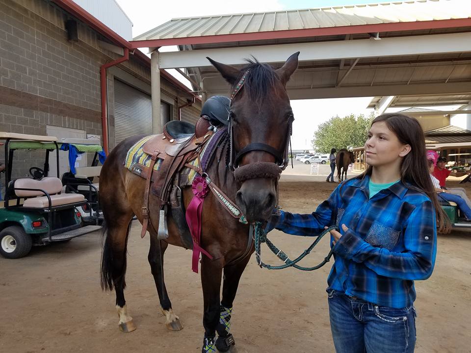 Emmy Madrigal with her horse