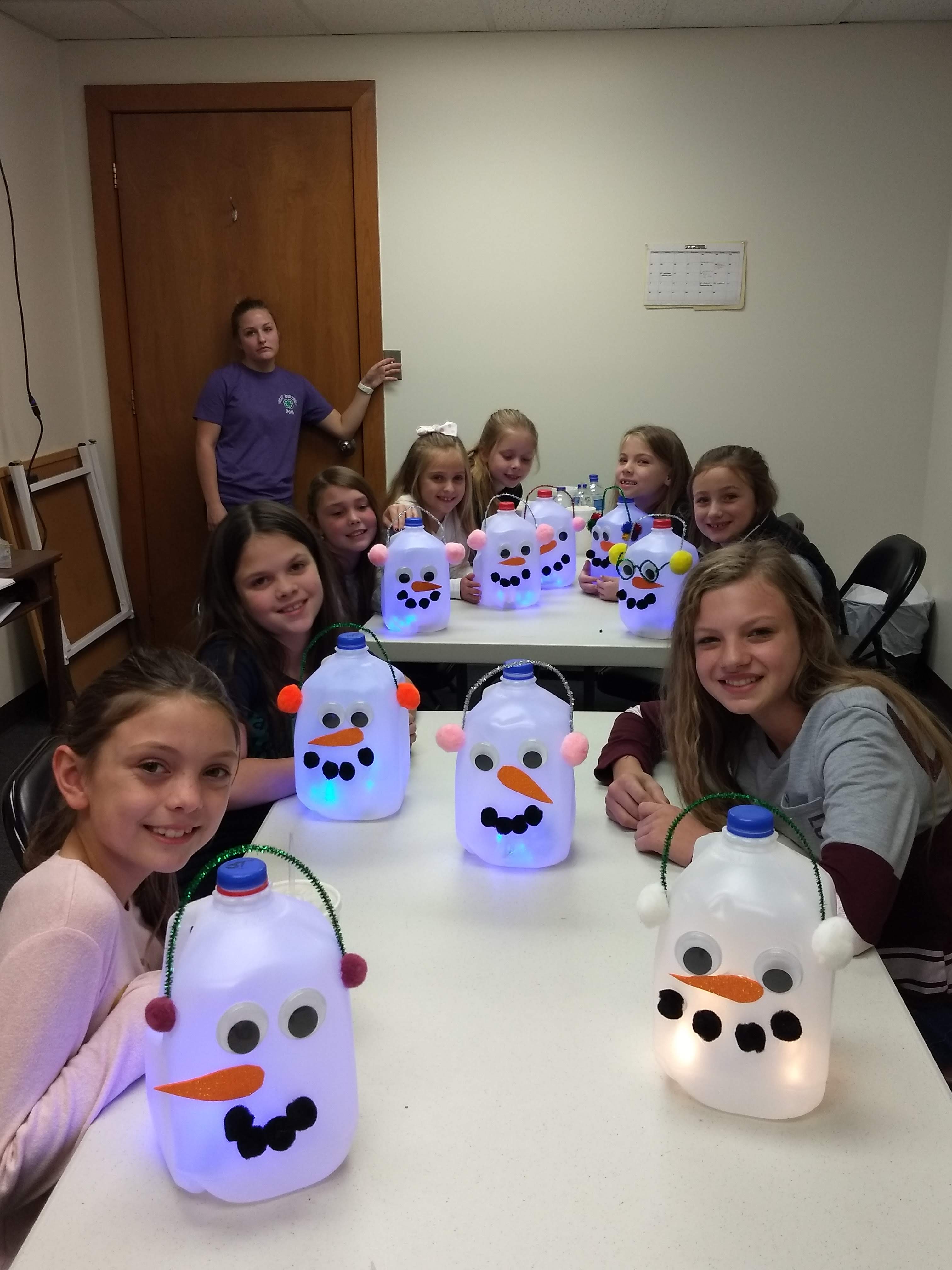kids making milk carton snowmen