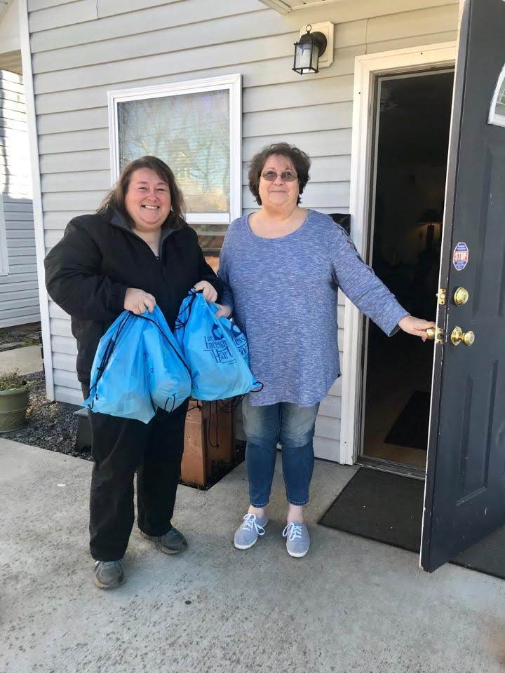 Shannon Coleman delivering bags