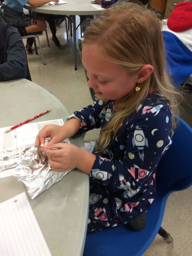 girl working on electric project