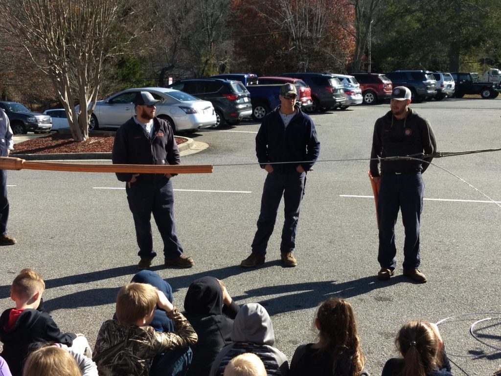 linemen teaching children