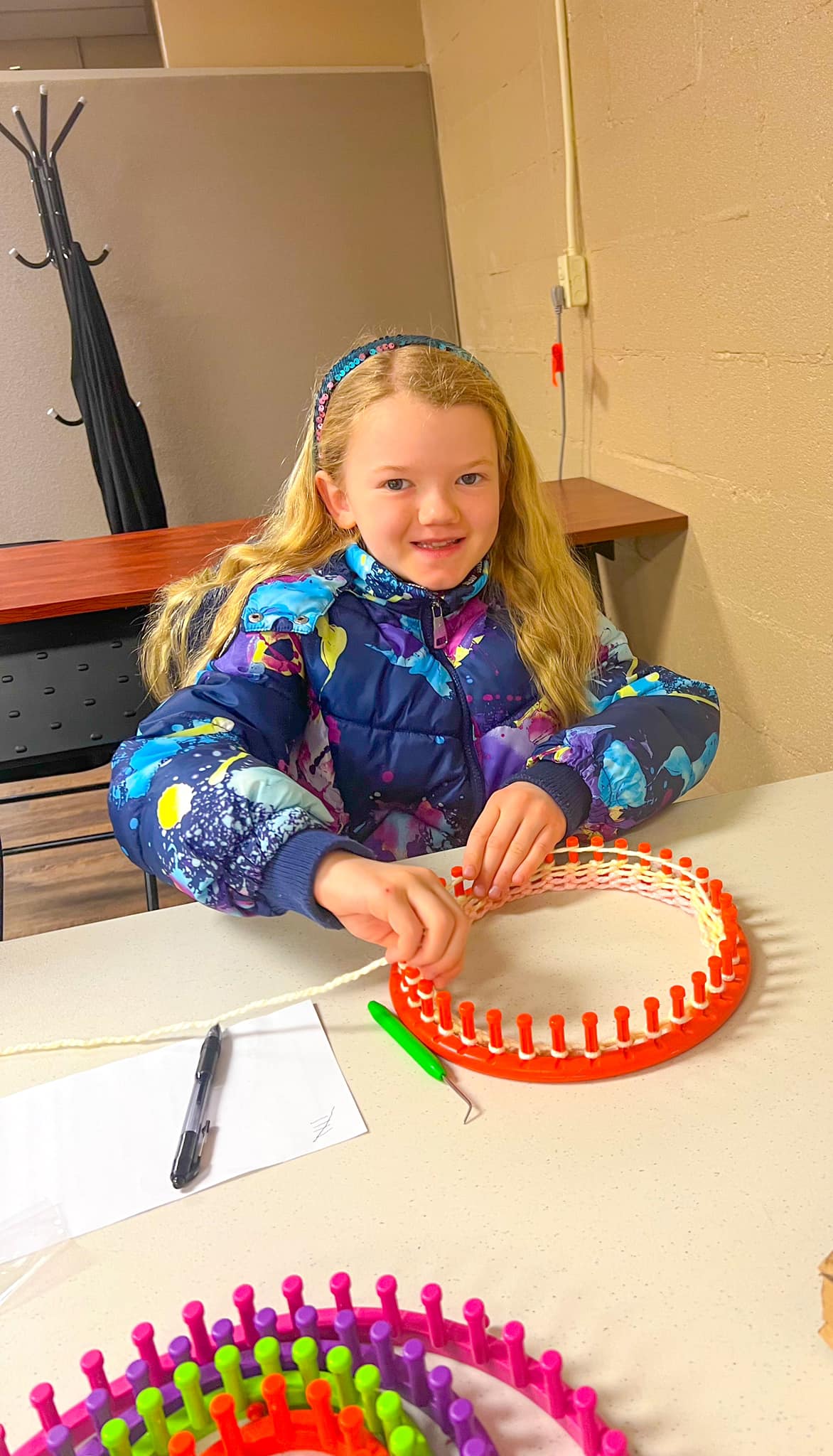 All Smiles for Learning the Skill of Loom Knitting