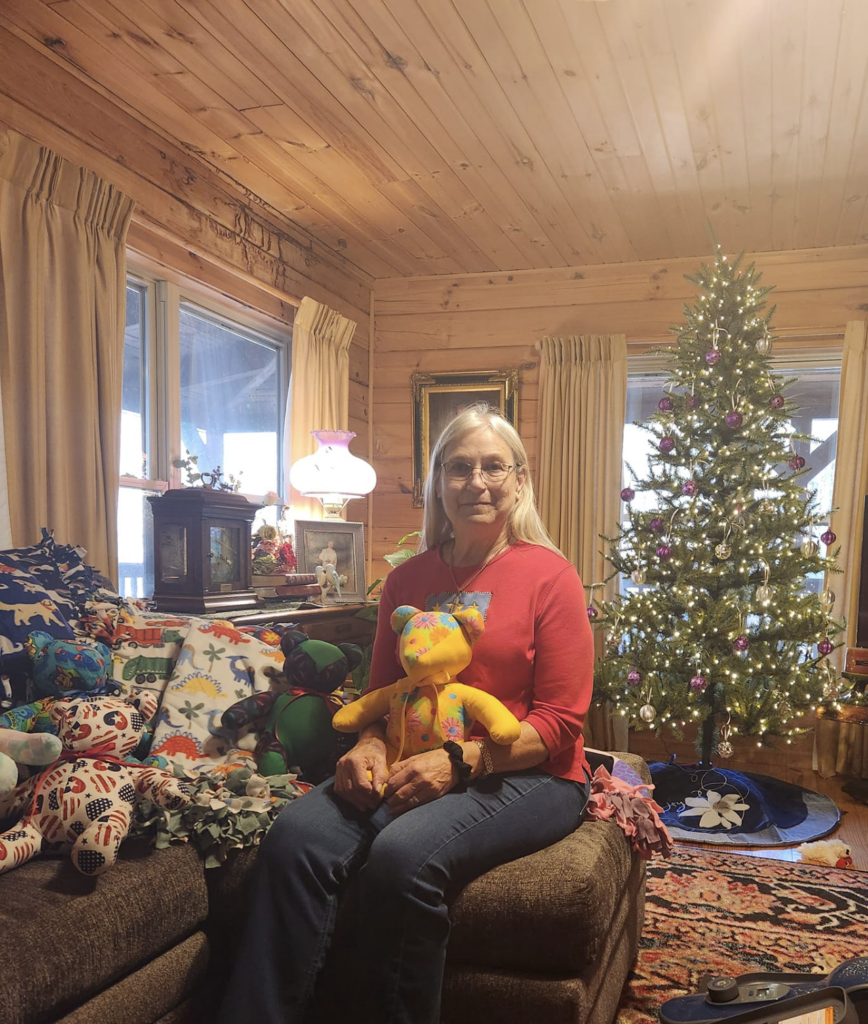 Robin Johnson, Grape Creek Homemaker makes bears for Children served by REACH